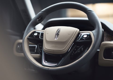 The intuitively placed controls of the steering wheel on a 2024 Lincoln Aviator® SUV | Mark Ficken Lincoln in Charlotte NC