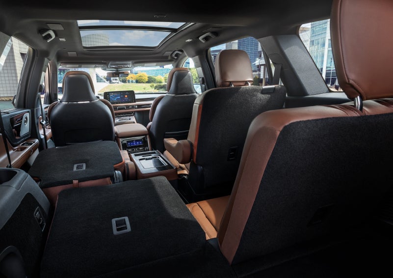 The interior of the 2025 Lincoln Aviator® SUV is shown with two seats folded down for added space. | Mark Ficken Lincoln in Charlotte NC