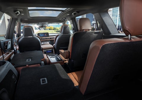 The interior of the 2025 Lincoln Aviator® SUV is shown with two seats folded down for added space. | Mark Ficken Lincoln in Charlotte NC
