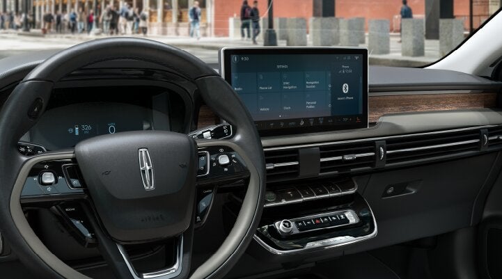 The center screen of the new 2025 Lincoln Corsair® SUV is showcased with its SYNC® 4 capabilities highlighted | Mark Ficken Lincoln in Charlotte NC