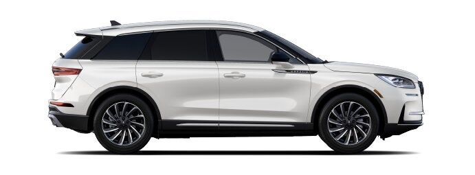 The passenger side of a Lincoln Corsair® SUV is shown in the Ceramic Pearl extra-cost exterior paint option. | Mark Ficken Lincoln in Charlotte NC